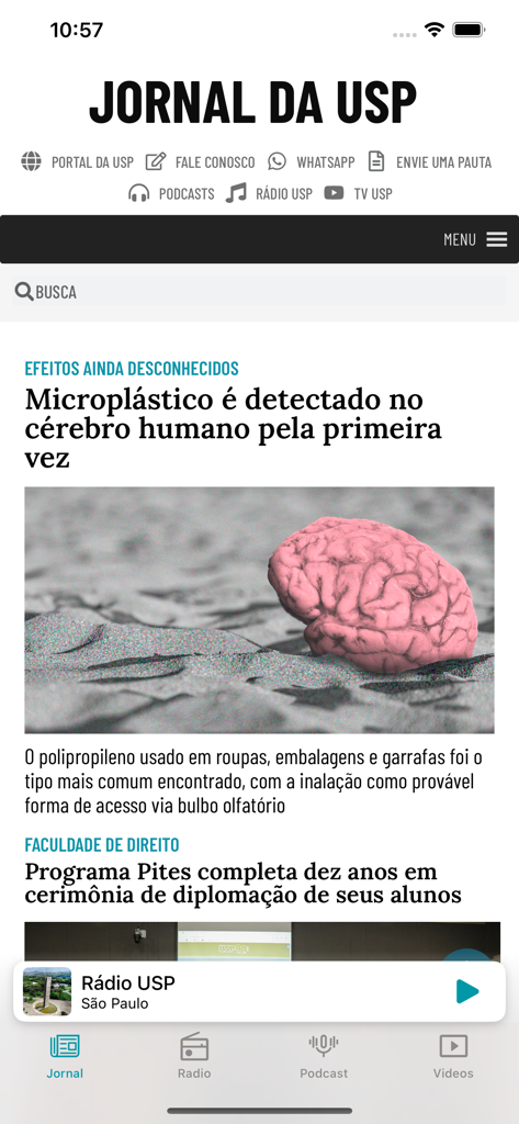 Jornal da USP - Jornal da USPアプリのインターフェース。科学研究に関するニュース記事と、ラジオやポッドキャストのナビゲーションアイコンが表示されています。