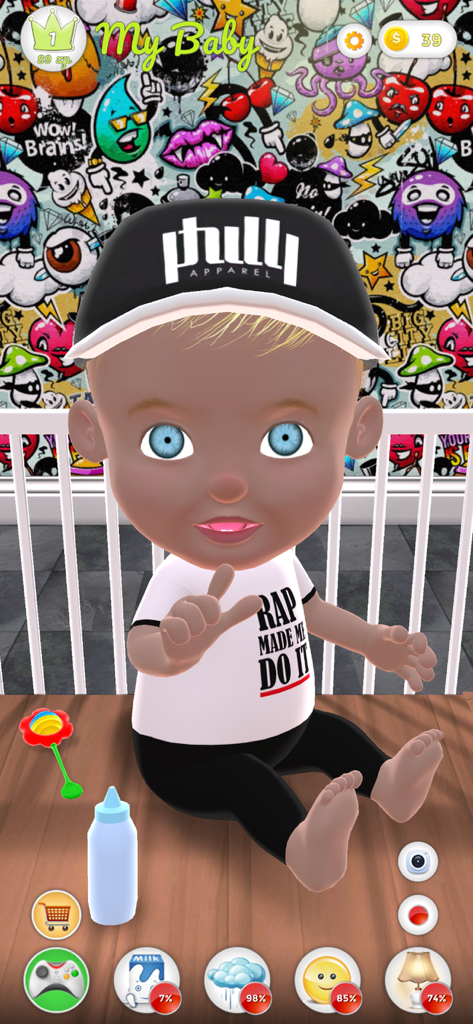 A virtual baby with a Philly baseball cap and rap t-shirt sitting in a nursery with care icons for feeding, bathing, and sleeping.