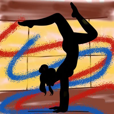 a woman doing a handstand