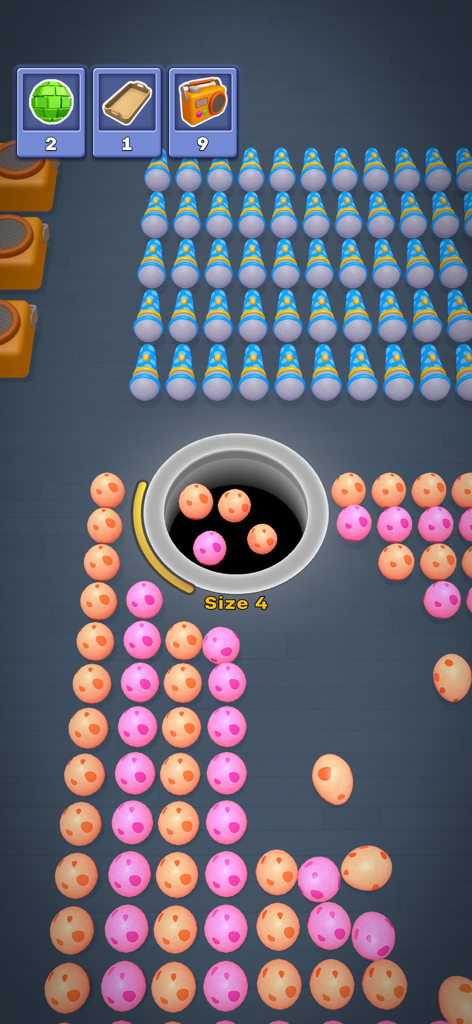 Hole It 3D - A black hole swallowing colorful spheres in the Hole It 3D mobile game