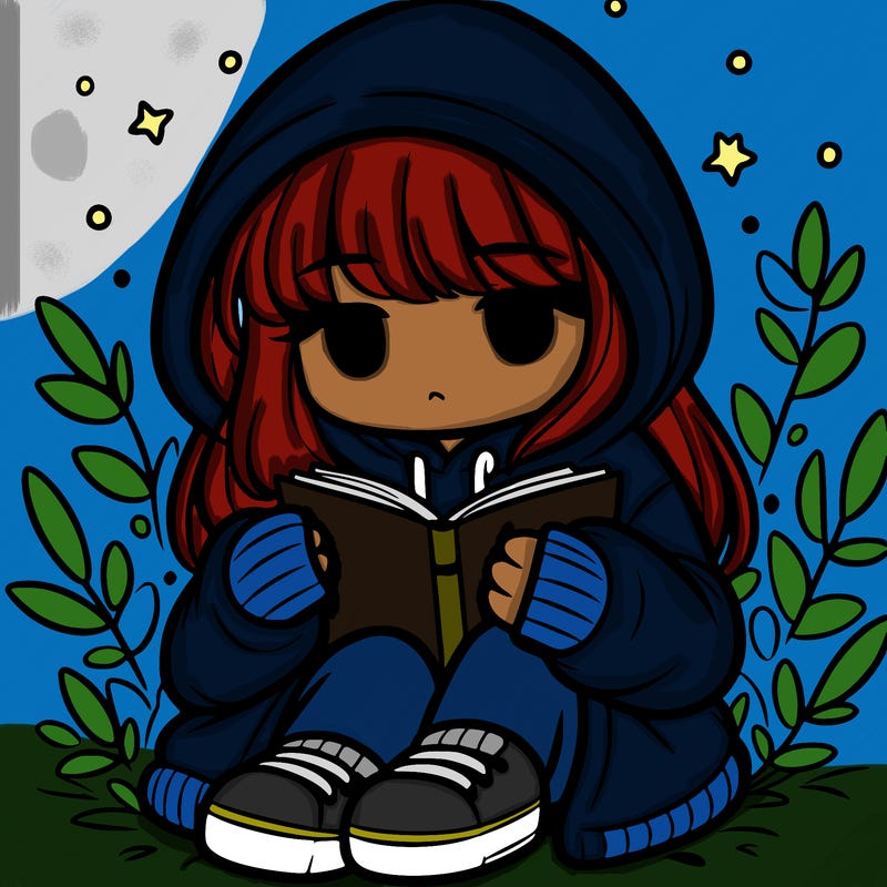 girl in oversized hoodie reading a book
