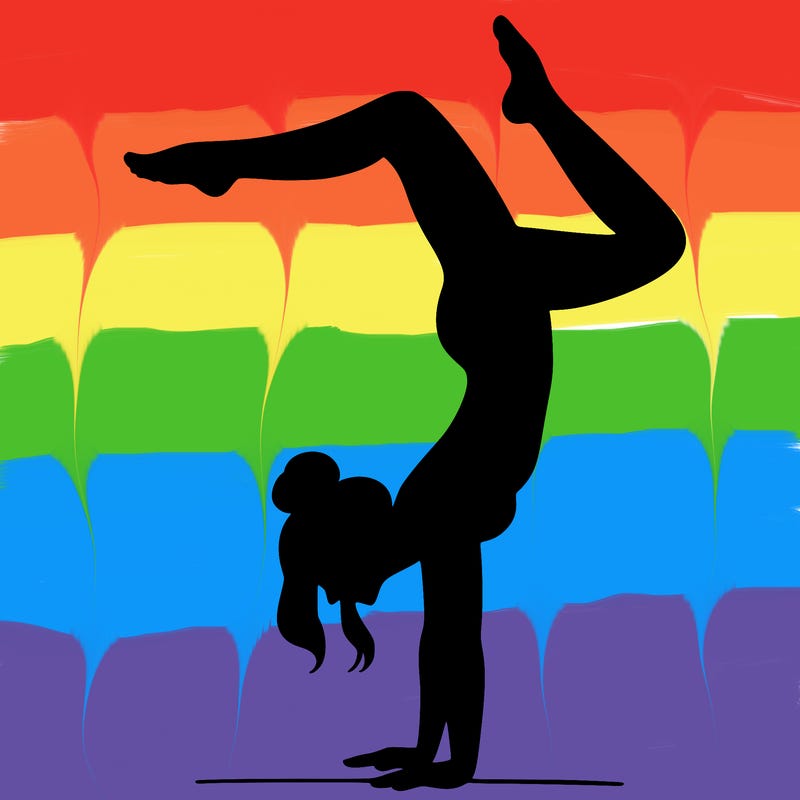 a woman doing a handstand