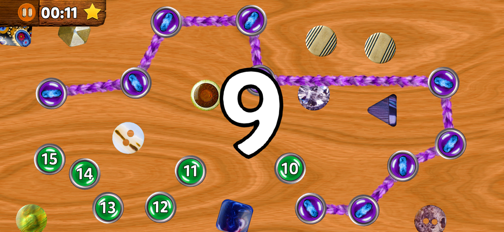 A children educational counting game with numbered buttons connected by purple yarn on a wooden background