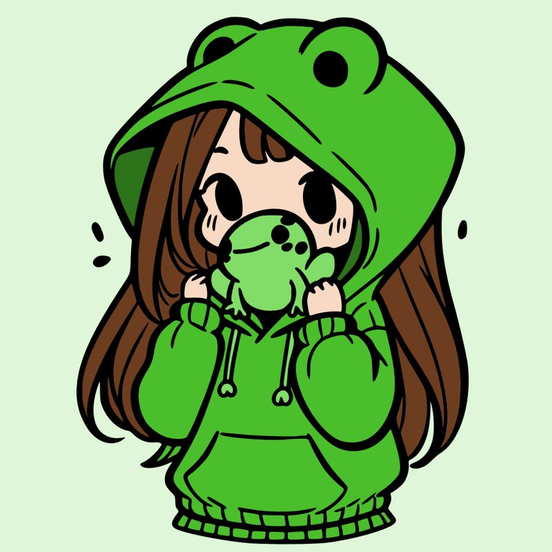 a girl holding a froggy hoodie