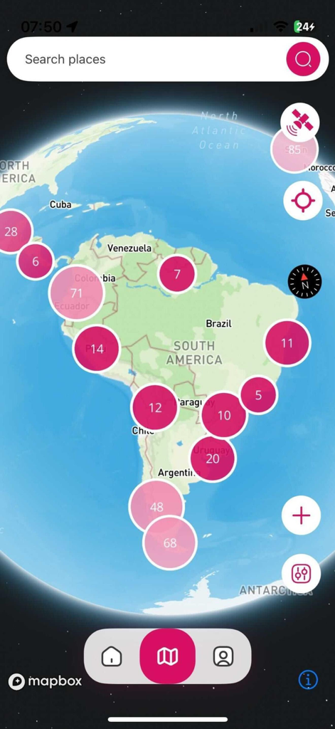 Rolling Around - Global map view focused on South America showing bikepacking waypoint clusters in the Rolling Around app