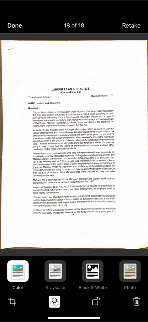 Uma interface de aplicativo móvel exibindo um documento digitalizado com várias opções de filtro de cores na parte inferior.