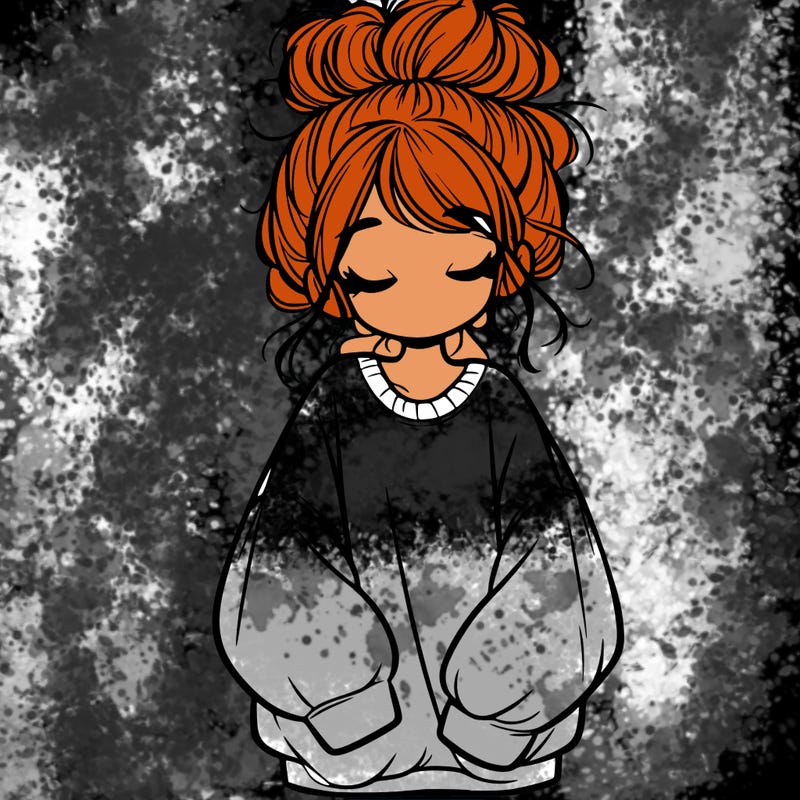 girl with baggy sweatshirt and messy bun