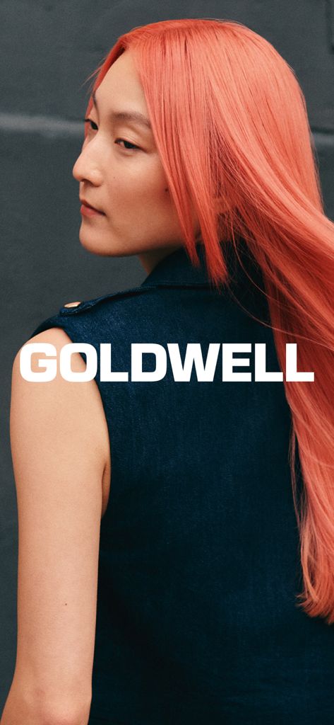 GOLDWELL EDUCATION PLUS - Model with long vibrant pink hair and Goldwell branding