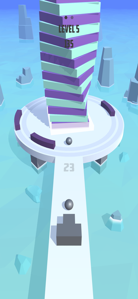 Fire Balls 3D - Fire Balls 3Dのゲームプレイ。紫とティールのブロックで構成された3Dタワーにボールキャノンがターゲットを定めている様子。