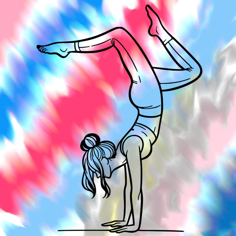 a woman doing a handstand