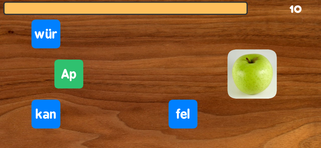 Schreiben mit Silben - Tela de jogo educativo mostrando blocos de sílabas alemãs e uma imagem de uma maçã verde para ensinar a construção de palavras