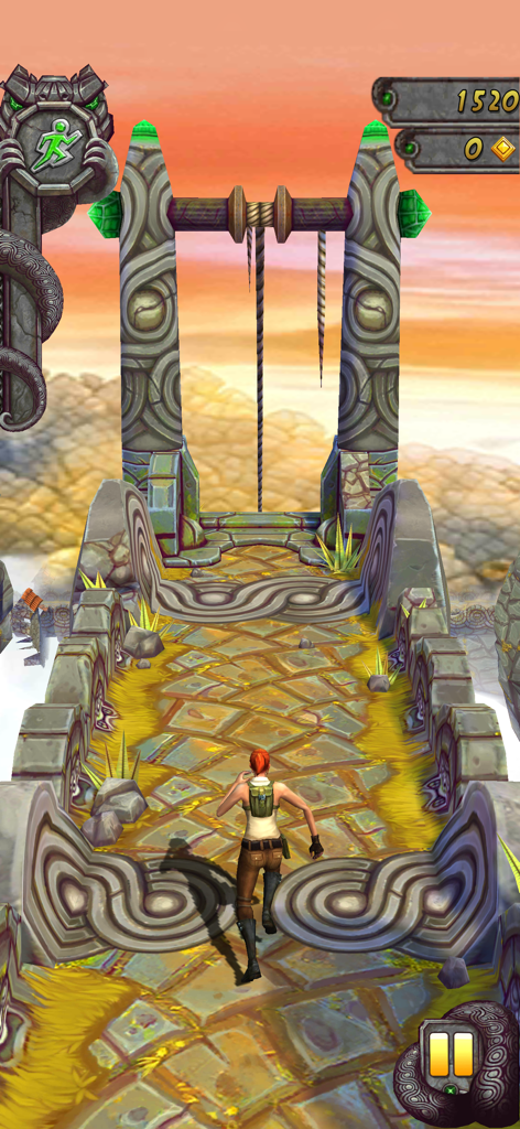 A character running on an elevated stone path in Temple Run 2 gameplay