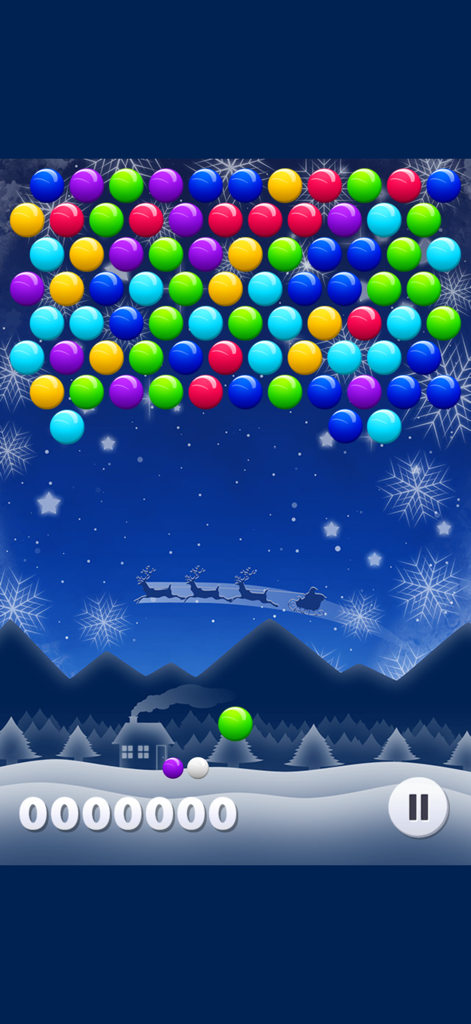 Jugabilidad de Smarty Bubbles XMAS Edition con coloridas burbujas y un paisaje invernal festivo con el trineo de Santa Claus.