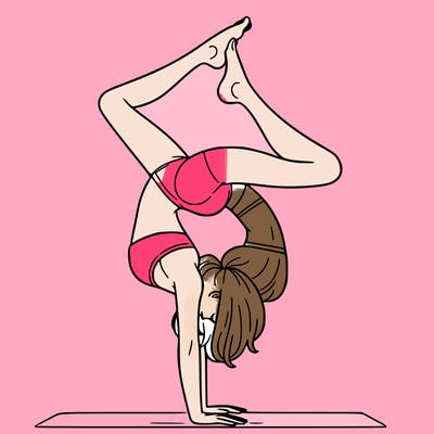 a woman doing a handstand