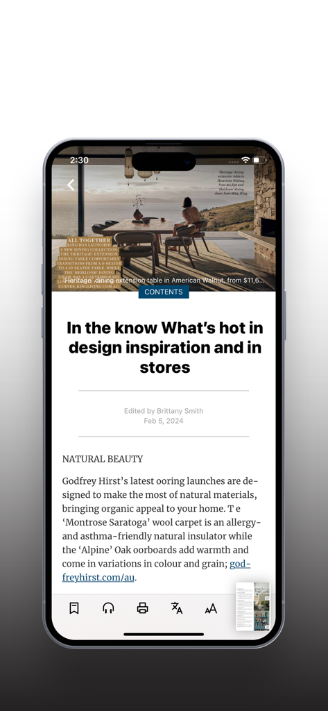 Smartphone screen displaying an interior design article from the Home Beautiful digital magazine app about the latest trends and natural home decor.