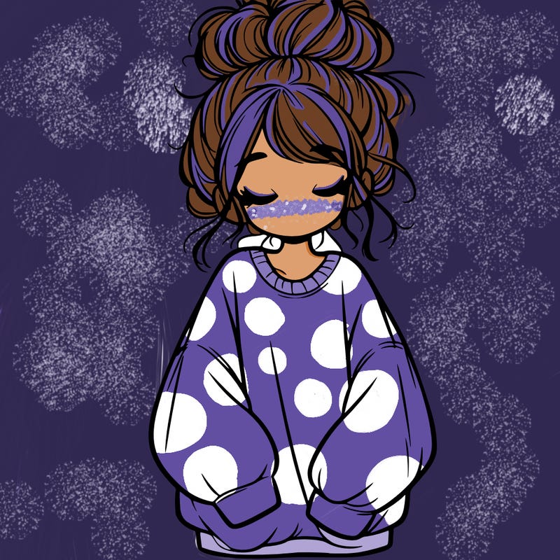 girl with baggy sweatshirt and messy bun