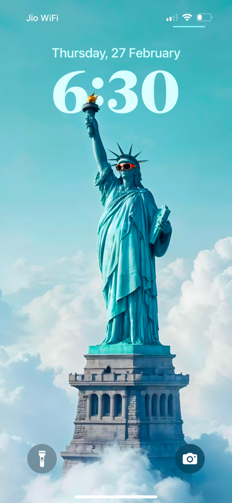 Lagguy Wallpaper Background - An iPhone lock screen featuring the Statue of Liberty wearing sunglasses as a high quality wallpaper