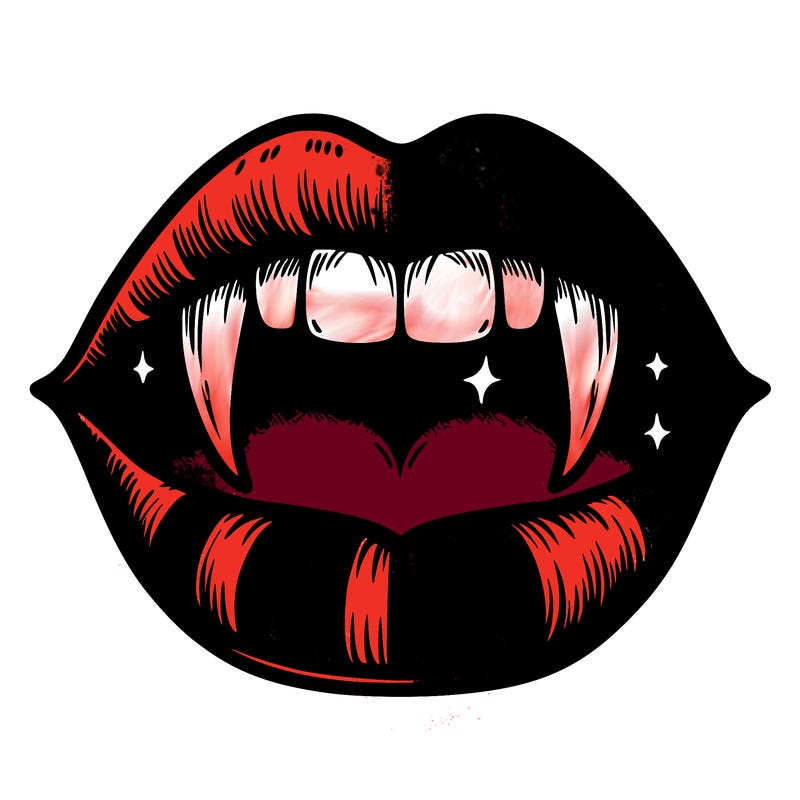 lips with vampire teeth