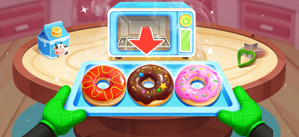 Little Panda's Restaurant - Colorful decorated donuts on a tray being held with green oven mitts in a kids cooking game kitchen.