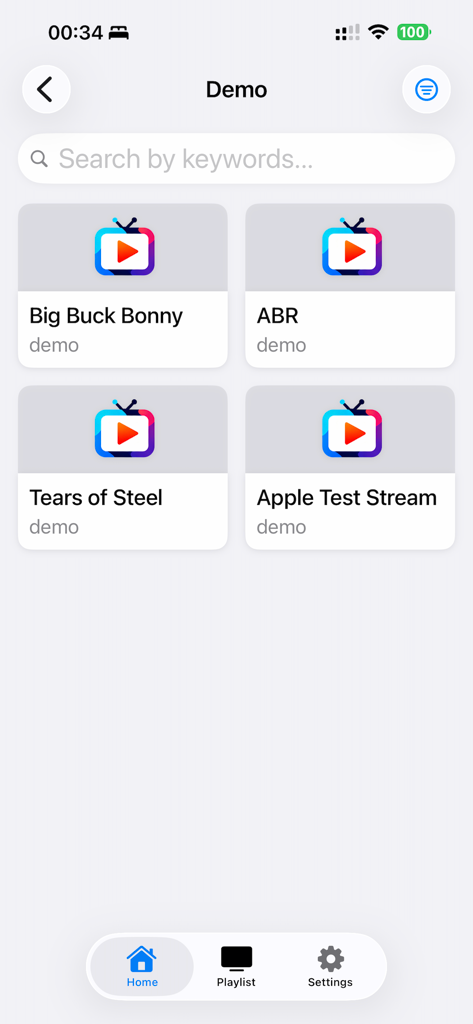 NanoTV - NanoTV media player home screen showing a video content library grid and bottom navigation menu