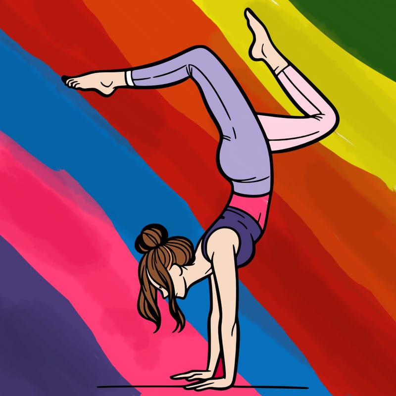 a woman doing a handstand