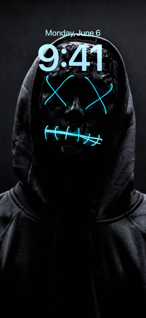 iPhone lock screen showing a dark wallpaper of a person in a hoodie with a glowing neon blue mask