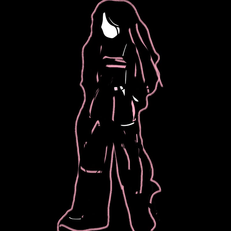 girl in baggy pants crop top and long hair