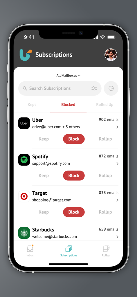 Unroll.Me - Email Cleanup - Unroll.Me app interface showing a list of email subscriptions with options to block keep or rollup