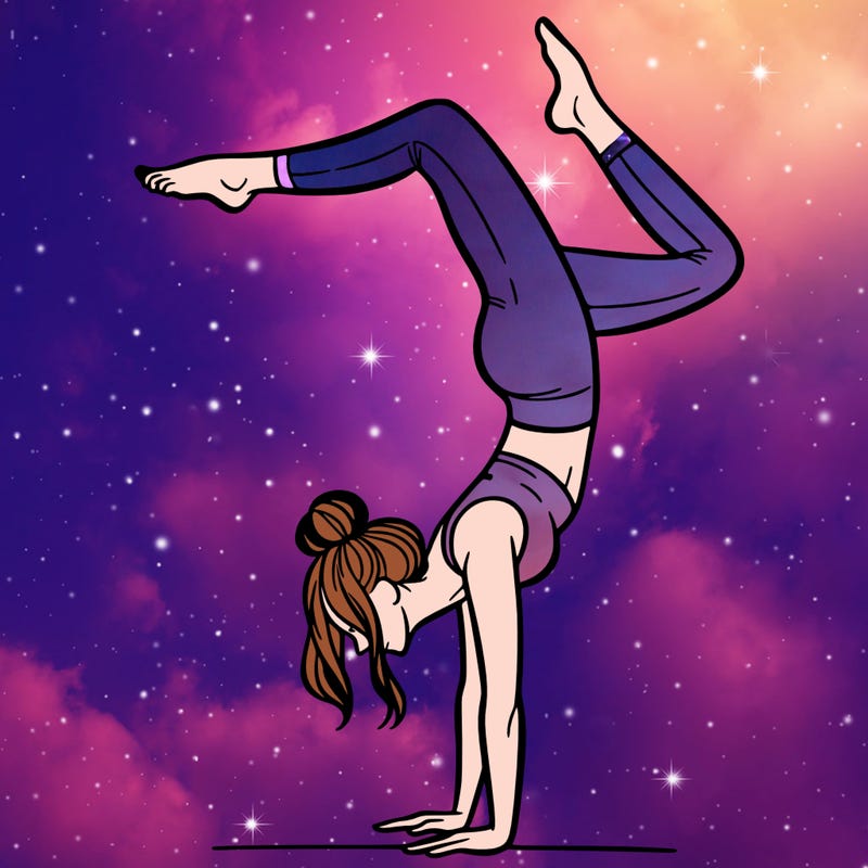 a woman doing a handstand