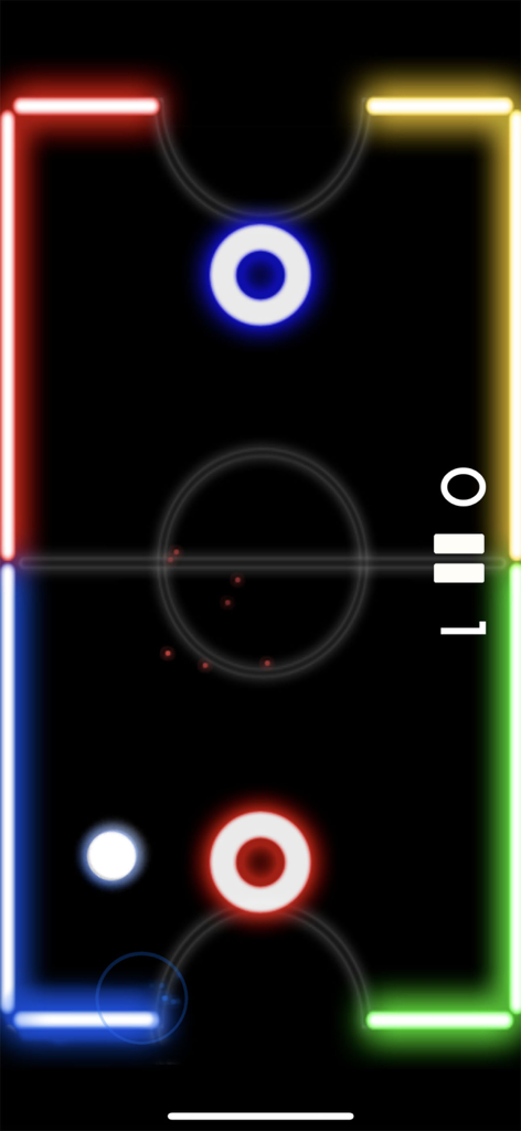 Vista dall'alto di un gioco di air hockey neon con palette rosse e blu e un disco bianco