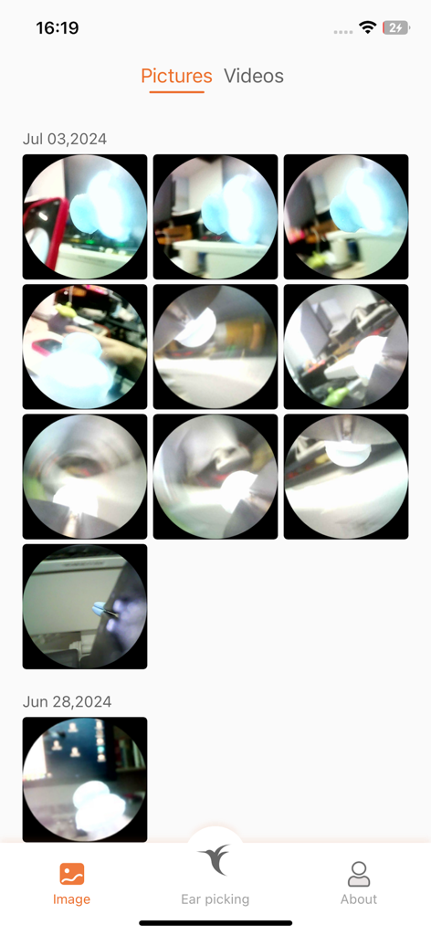 bebird - Bebird アプリのスクリーンショット。視覚式耳クリーニングデバイスから保存された写真やビデオのギャラリーが表示されます。