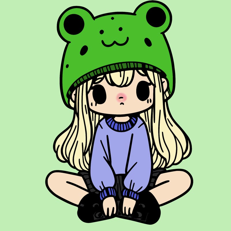 a girl wearing a frog hat and some frog socks
