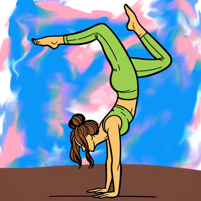 a woman doing a handstand