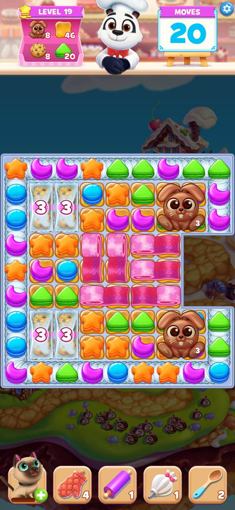 Tela de jogabilidade do jogo Cookie Jam Match 3 apresentando um tabuleiro de quebra-cabeça com biscoitos coloridos e o Chef Panda