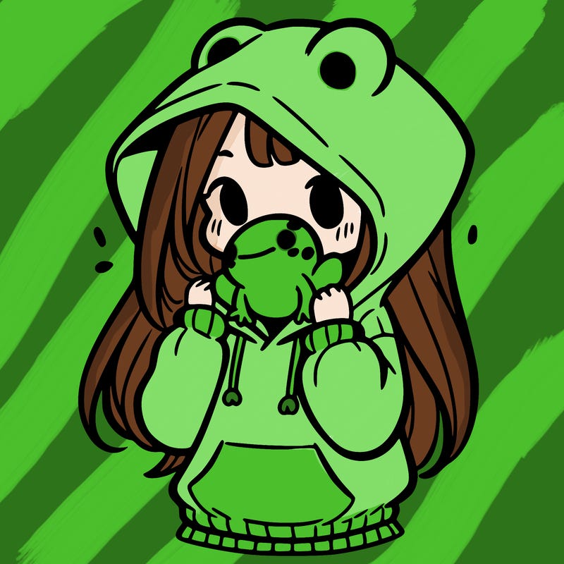 a girl holding a froggy hoodie