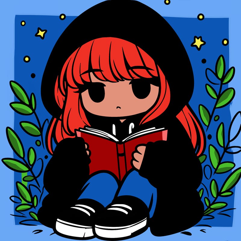 girl in oversized hoodie reading a book