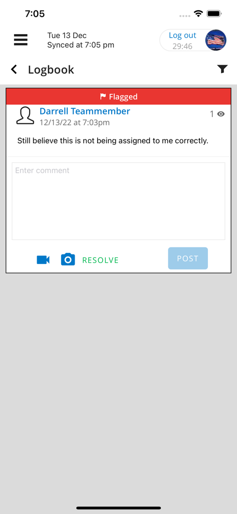 A flagged entry in the Jolt app logbook showing a team member comment and options to resolve the issue.