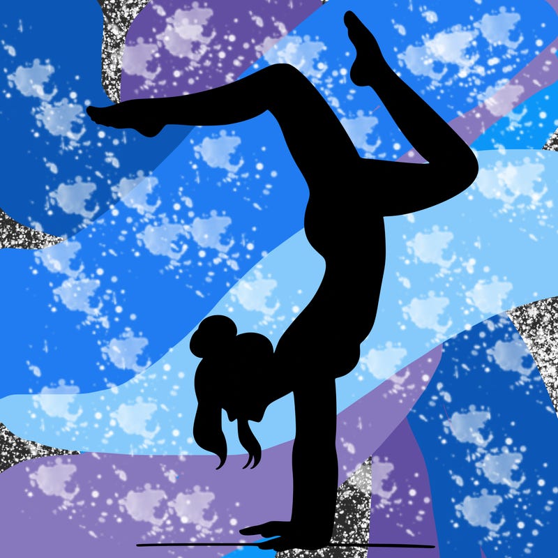 a woman doing a handstand
