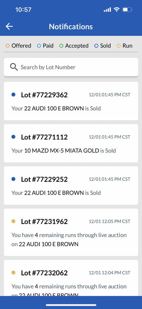 Mobile app screen showing a list of vehicle sale notifications and auction status updates for a car dealer