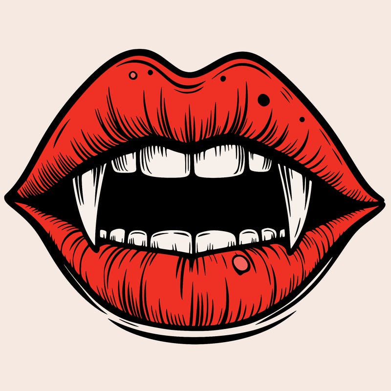 lips with vampire teeth