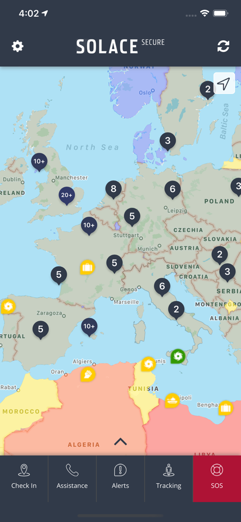 Solace Secure - Solace Secure app interface showing a global risk map with security alerts and a prominent SOS button