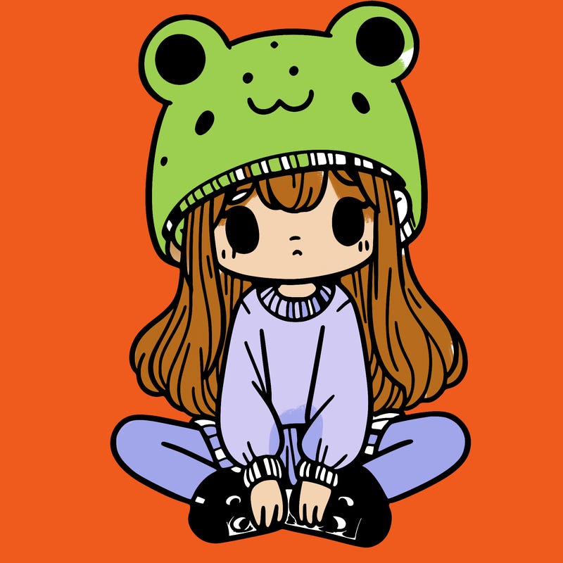 a girl wearing a frog hat and some frog socks