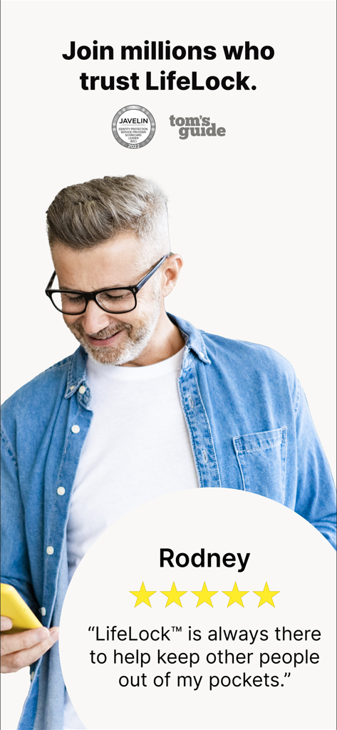 A middle aged man with glasses smiling while giving a five star review for the LifeLock identity protection app