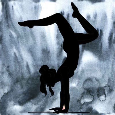 a woman doing a handstand