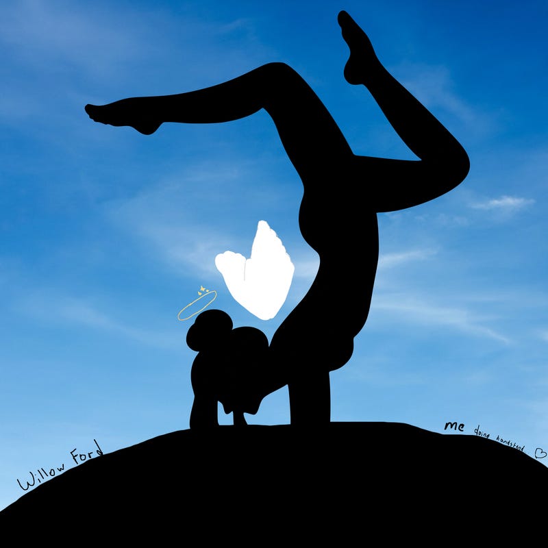a woman doing a handstand