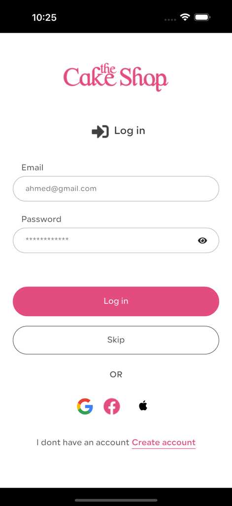 Login screen for The Cake Shop app showing email and password fields plus social login options for Google Facebook and Apple
