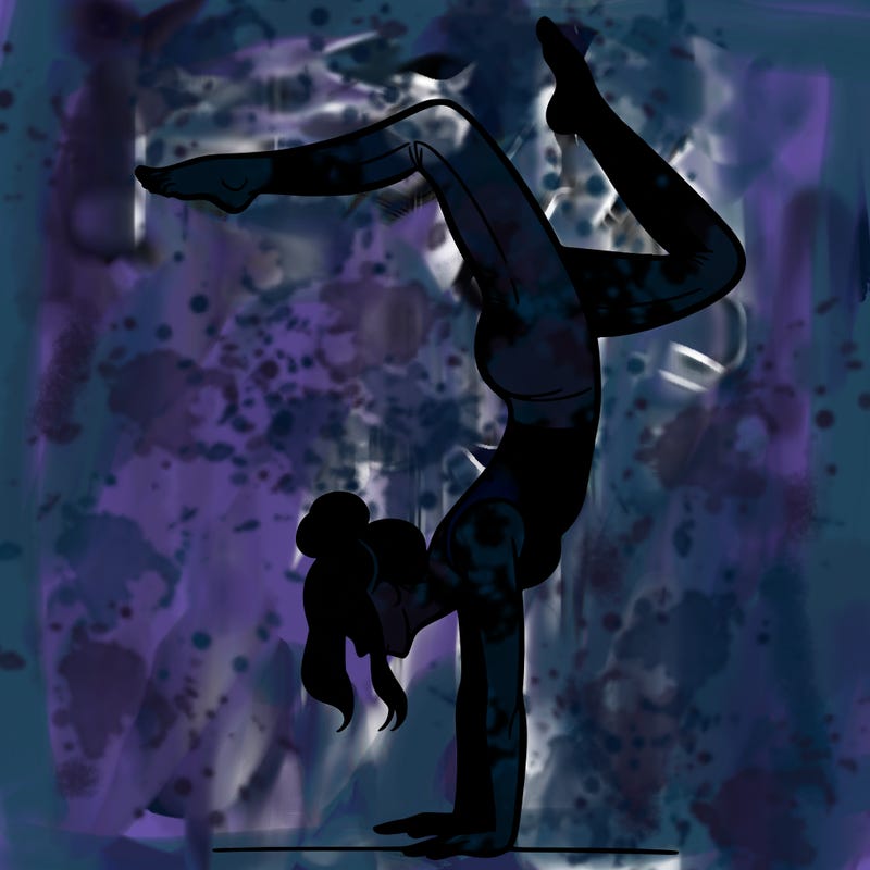 a woman doing a handstand