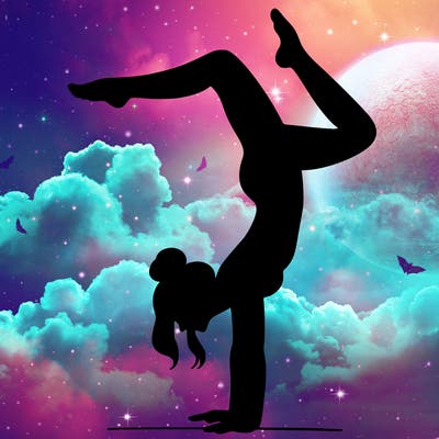 a woman doing a handstand