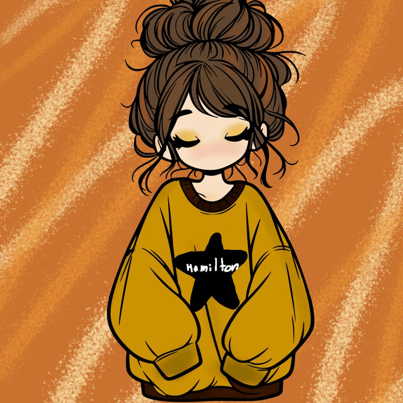 girl with baggy sweatshirt and messy bun