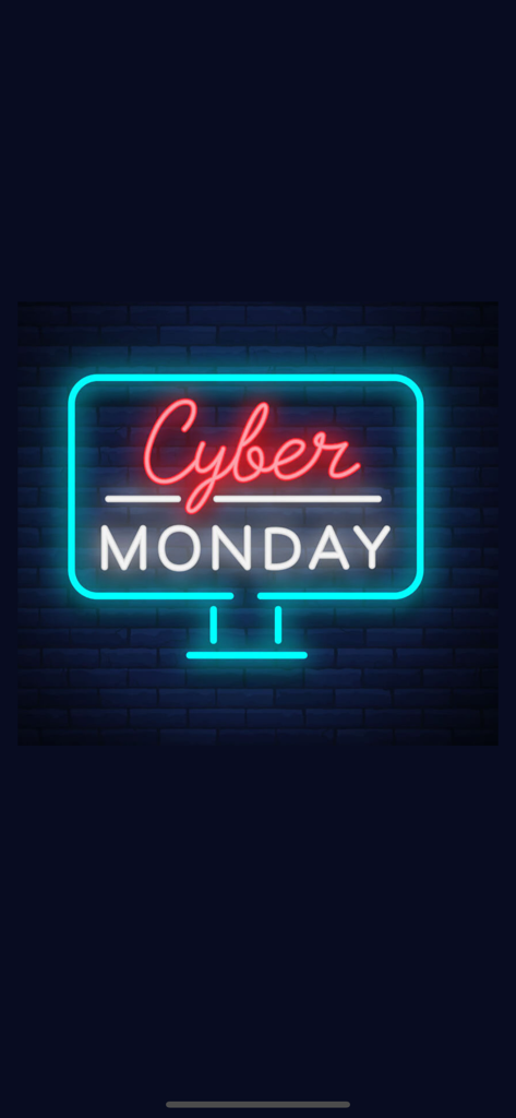 Cyber Monday 2025 ads & deals - 暗いレンガの壁に掲げられた、モニターの形をしたサイバーマンデーのネオンサイン